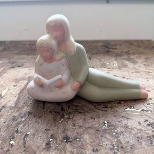 Charming Family Figurine in Pastel Tones